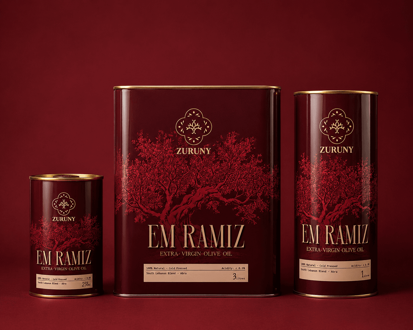 Three Em Ramiz tins on a deep red ground